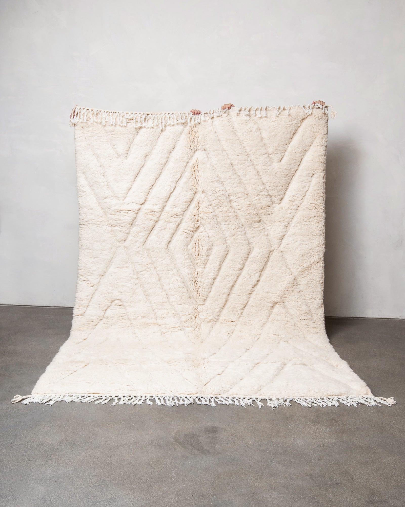 Modern, designer, handcrafted Berber rug from Morocco. Beniourain carpet with beautiful colours and patterns and fluffy wool texture.